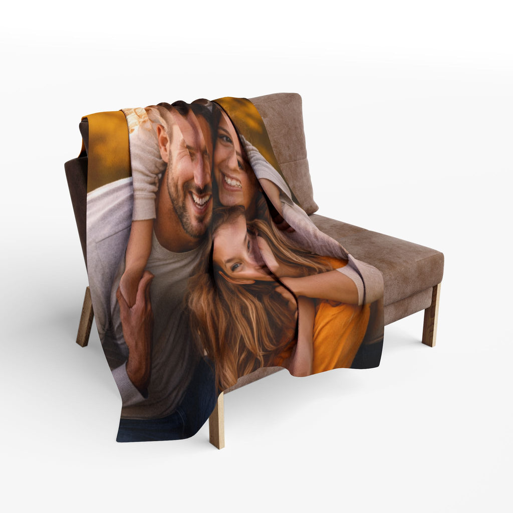 Personalized photo blanket with a couple on a chair